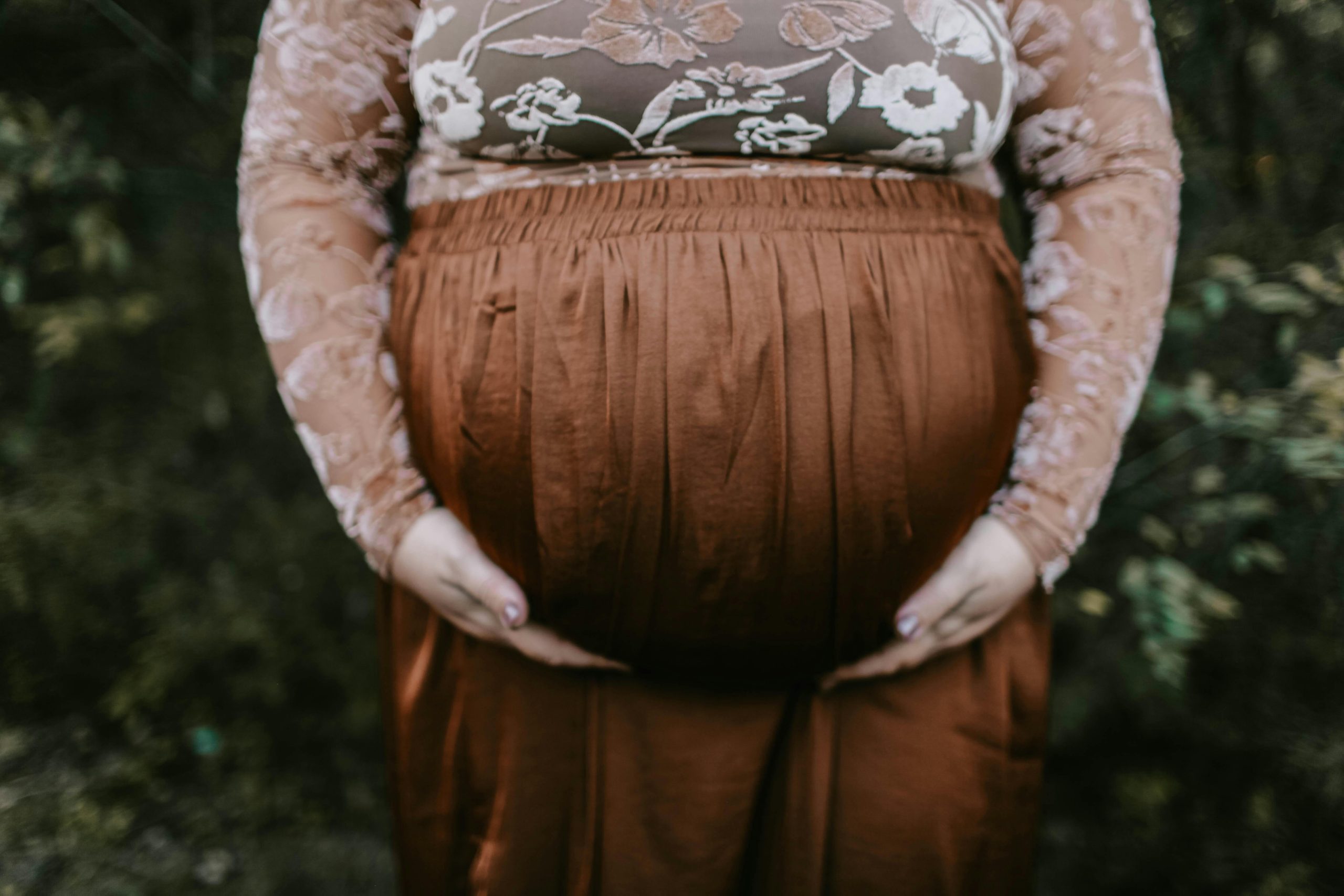 A beautiful outdoor maternity portrait capturing the essence of pregnancy and nature.