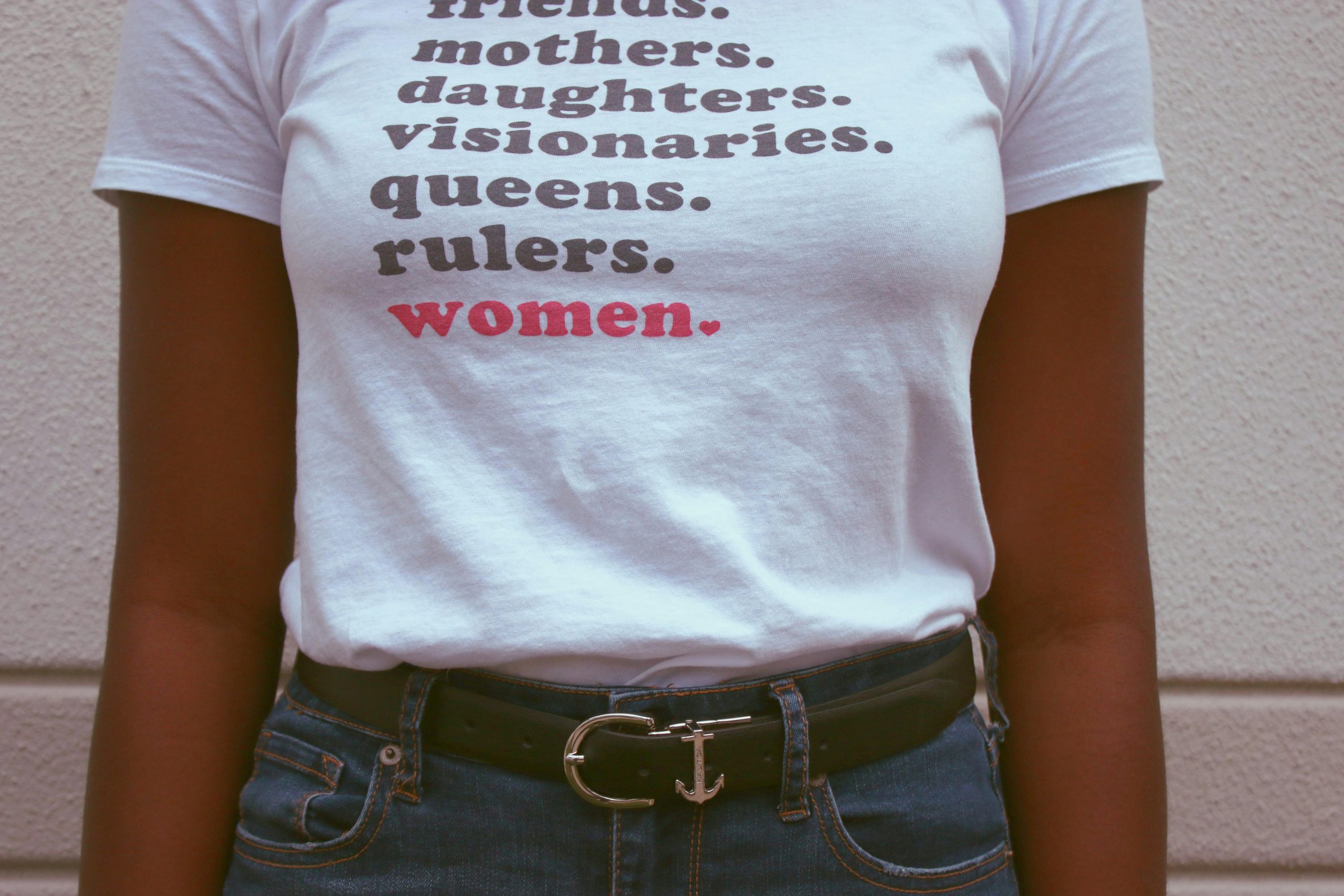 Close-up of a t-shirt celebrating women's roles and empowerment.