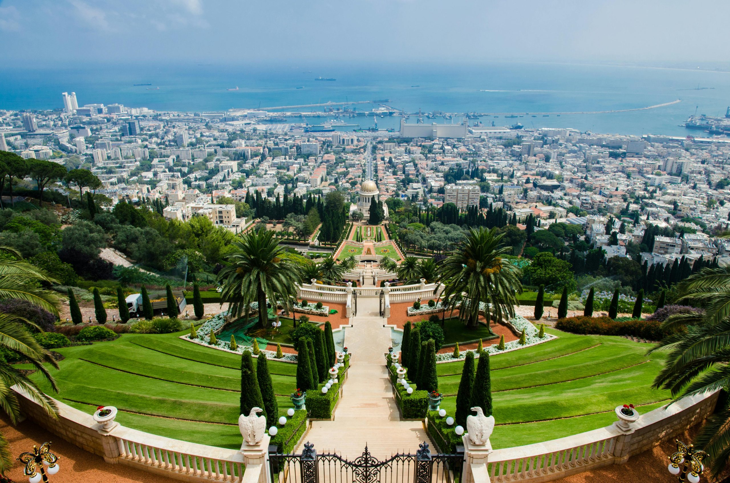 Stunning aerial view of Bahá'í Gardens and Haifa cityscape, a prominent tourist landmark in Israel.