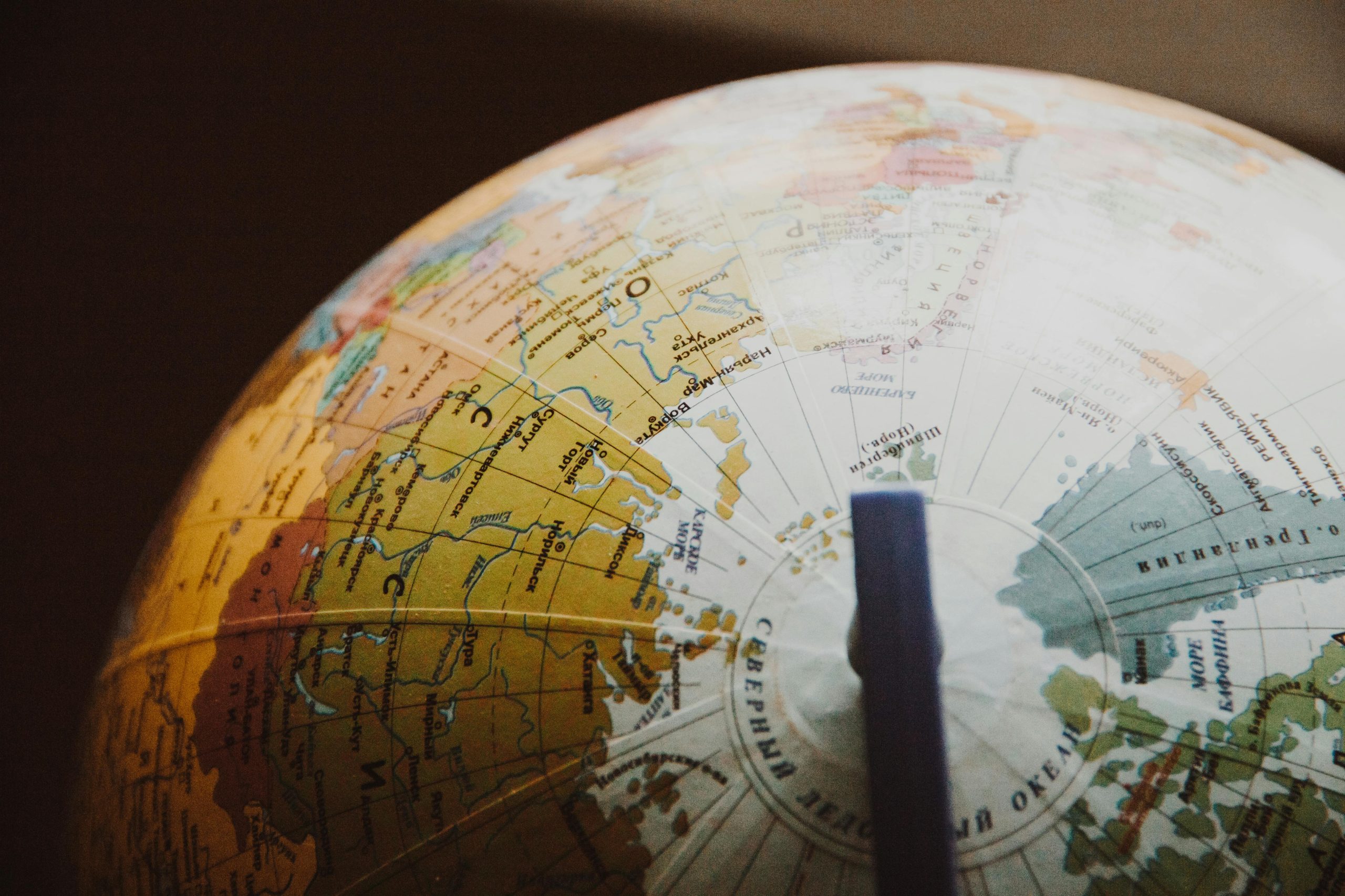 A detailed image of a globe highlighting various countries and regions.